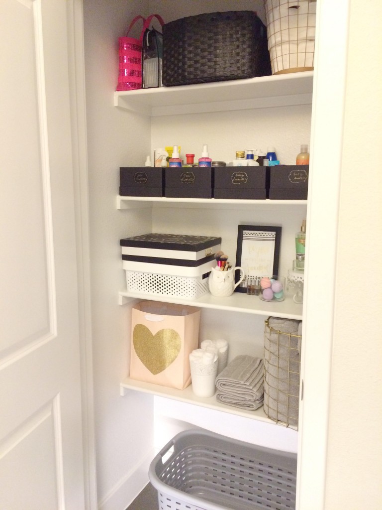 Inside of the bathroom and linen closet