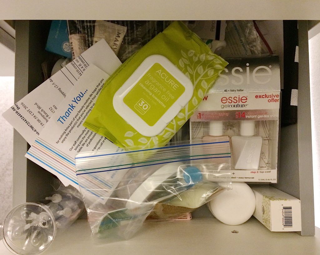 Second shot of cluttered lower bathroom drawer