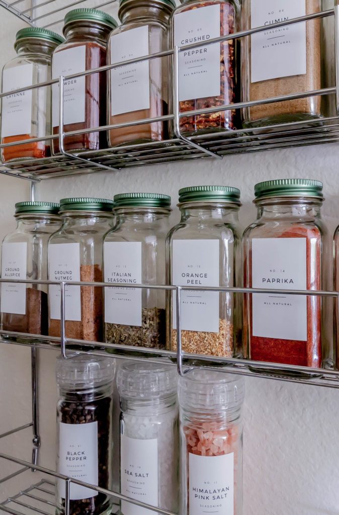 spice jars on rack on wall
